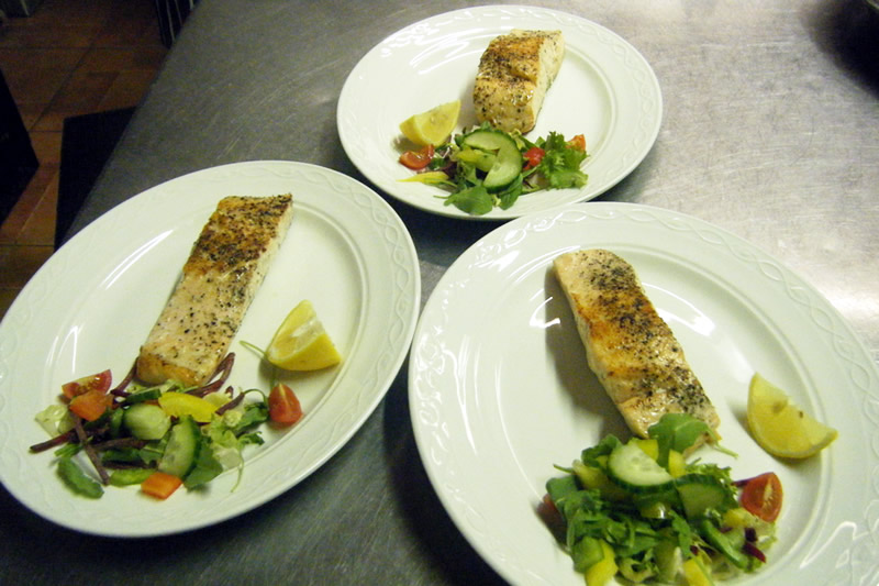 Fish fillets with lemon & salad served at the Gables restuarant in Ballinagleragh, County Leitrim